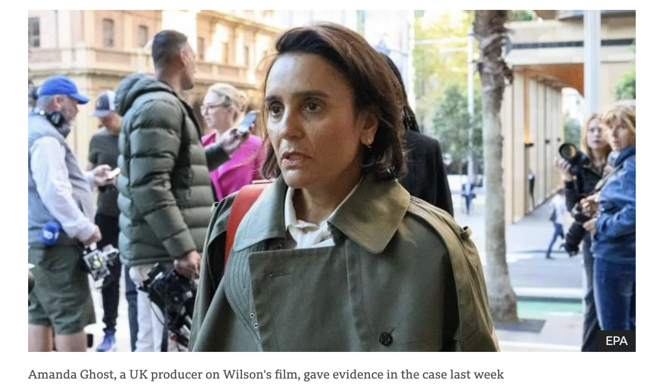 Amanda Ghost, UK producer on Wilson's film, outside the Federal Court of Australia in an olive utility jacket